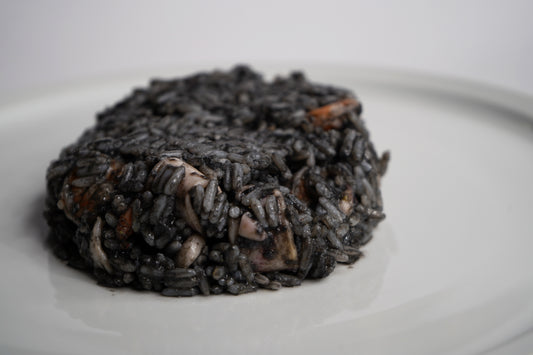 Arroz negro con chipirón y gambas